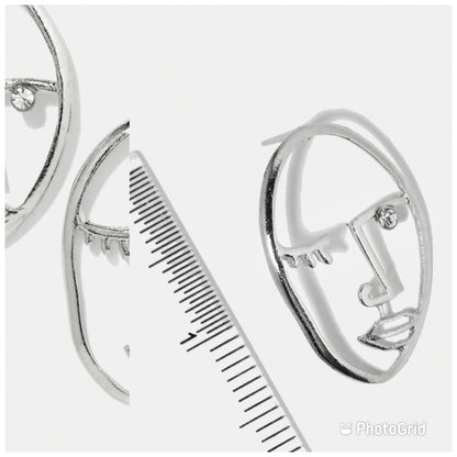 Whole face statement earrings